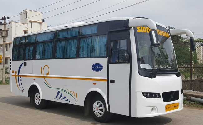 27 seater bus rental in delhi